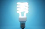 Light Bulb on Blue Background
